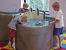 The river water table is a working replica of the Mississippi River dam located in Grand Rapids